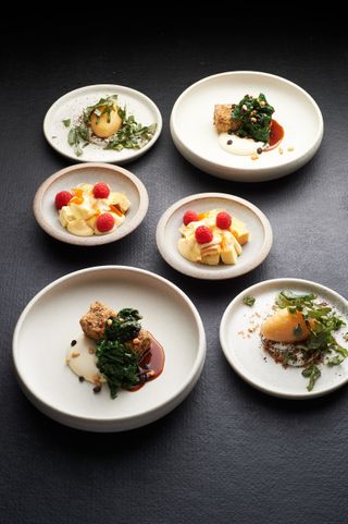 Spread of small sweet & savoury dishes
