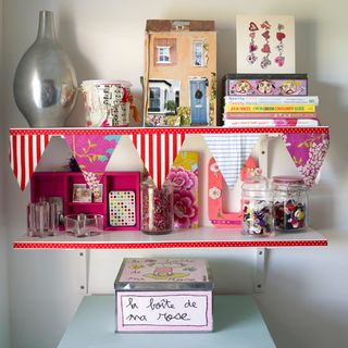 shelving with crafting and bunting flag