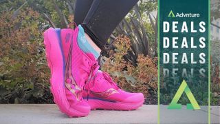 Woman's feet wearing Saucony Endorphin Edge running shoes