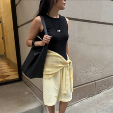 Dawn in a black and butter yellow summer shorts outfit