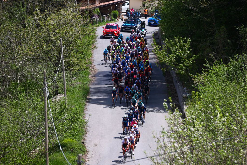 POTENZA ITALY MAY 13 A general view of the peloton beginning to climb the Monte Sirino 1402m during the 105th Giro dItalia 2022 Stage 7 a 196km stage from Diamante to Potenza 717m Giro WorldTour on May 13 2022 in Potenza Italy Photo by Michael SteeleGetty Images