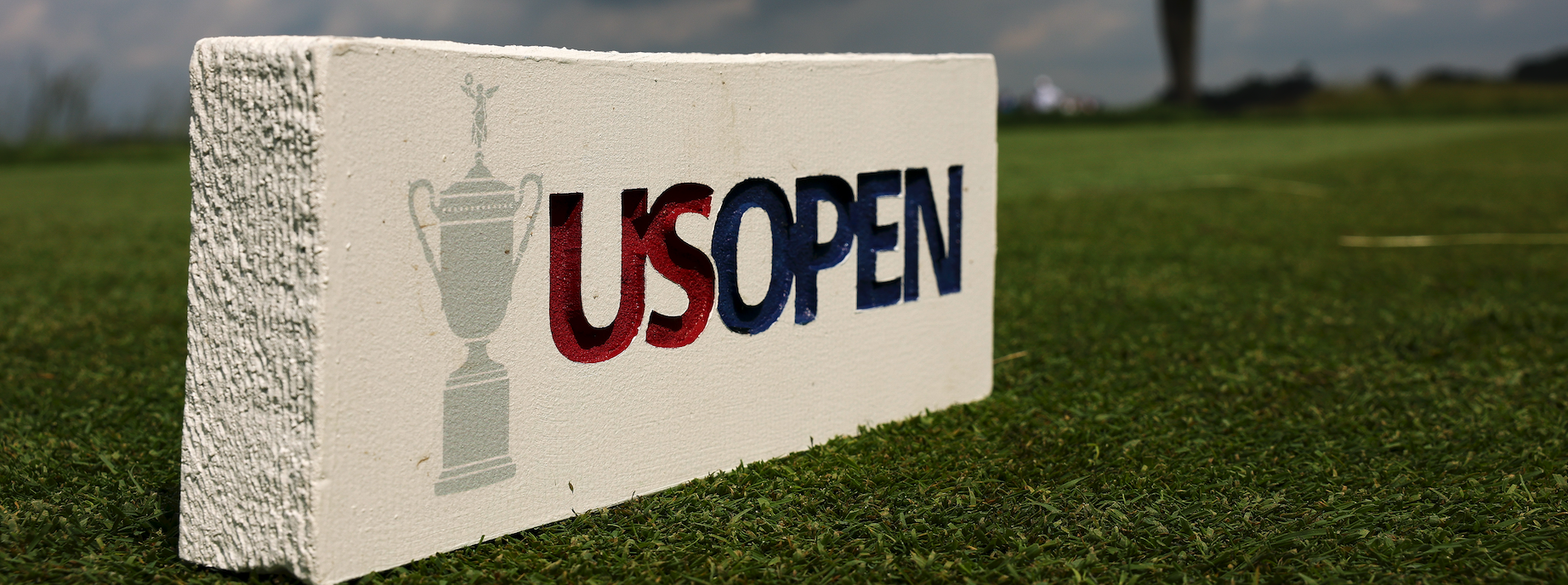 A US Open white tee marker