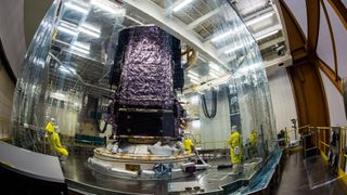 The James Webb Space Telescope being attached to a launch vehicle adaptor ahead of its journey to space.