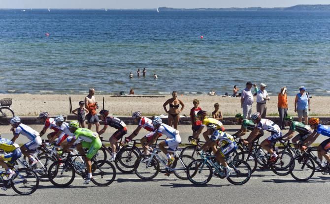 The Tour of Denmark peloton faced record heat during stage 3 and would have appreciated a swim to cool off.