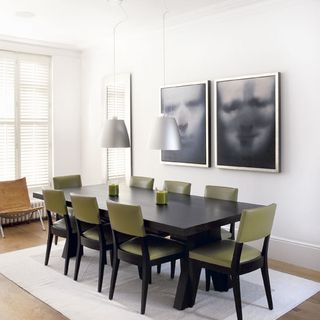 dinning area with dinning table chair and white wall