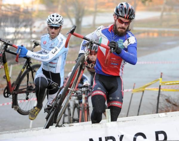 Dan Timmerman (Richard Sachs - RGM Watches - Radix) leads Adam Myerson (Cycle - Smart) over the barriers. Note the $1 bill wedged in the barrier.