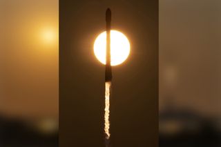 Photo of SpaceX Falcon 9 rocket crossing the sun during launch.