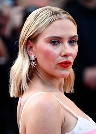 Scarlett Johansson attends the "Asteroid City" red carpet during the 76th annual Cannes film festival at Palais des Festivals on May 23, 2023 in Cannes, France