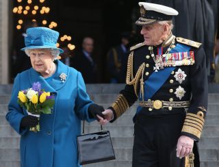 LONDON, ENGLAND - MARCH 13: Prince Philip, Duke of Edinburgh (R) and Queen Elizabeth II depart a Service of Commemoration for troops who were stationed in Afghanistan, London, England, March 13, 2015. (Photo by Chris Jackson/Getty Images)