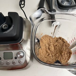 close up of ground nuts and seeds inside Sage Super Q blender jug