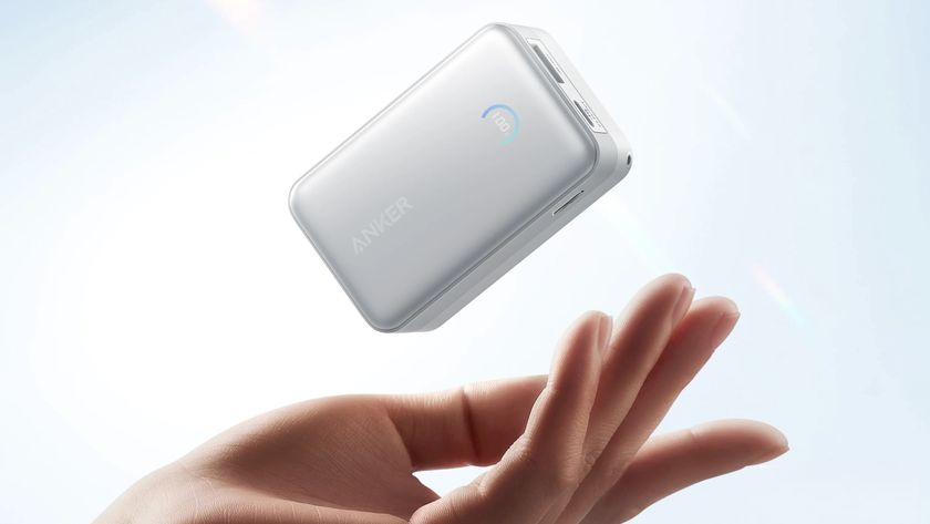 The Anker Nano Portable Charger hovering over a hand