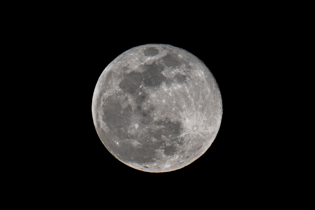  Full Snow Moon rises over San Mateo Bridge of San Francisco Bay in San Mateo, California, United States on February 24, 2024.