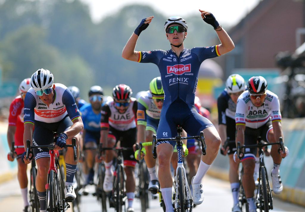 ARDOOIE BELGIUM SEPTEMBER 02 Tim Merlier of Belgium and Team AlpecinFenix celebrates winning ahead of Mads Pedersen of Denmark and Team Trek Segafredo and Peter Sagan of Slovakia and Team Bora Hansgrohe during the 17th Benelux Tour 2021 Stage 4 a 1661km stage from Aalter to Ardooie BeneluxTour on September 02 2021 in Ardooie Belgium Photo by Luc ClaessenGetty Images
