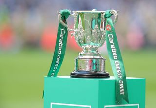 The Carabao Cup on a green plinth at Wembley Stadium, February 2023