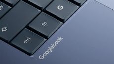 Close-up shot of a Googlebook chassis with branding on grey-colored frame underneath ctrl button.