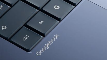 Close-up shot of a Googlebook chassis with branding on grey-colored frame underneath ctrl button.