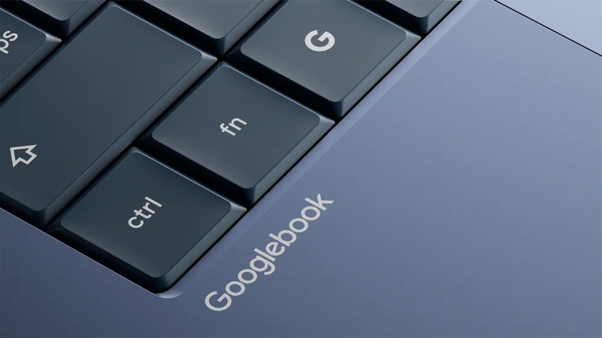 Close-up shot of a Googlebook chassis with branding on grey-colored frame underneath ctrl button.