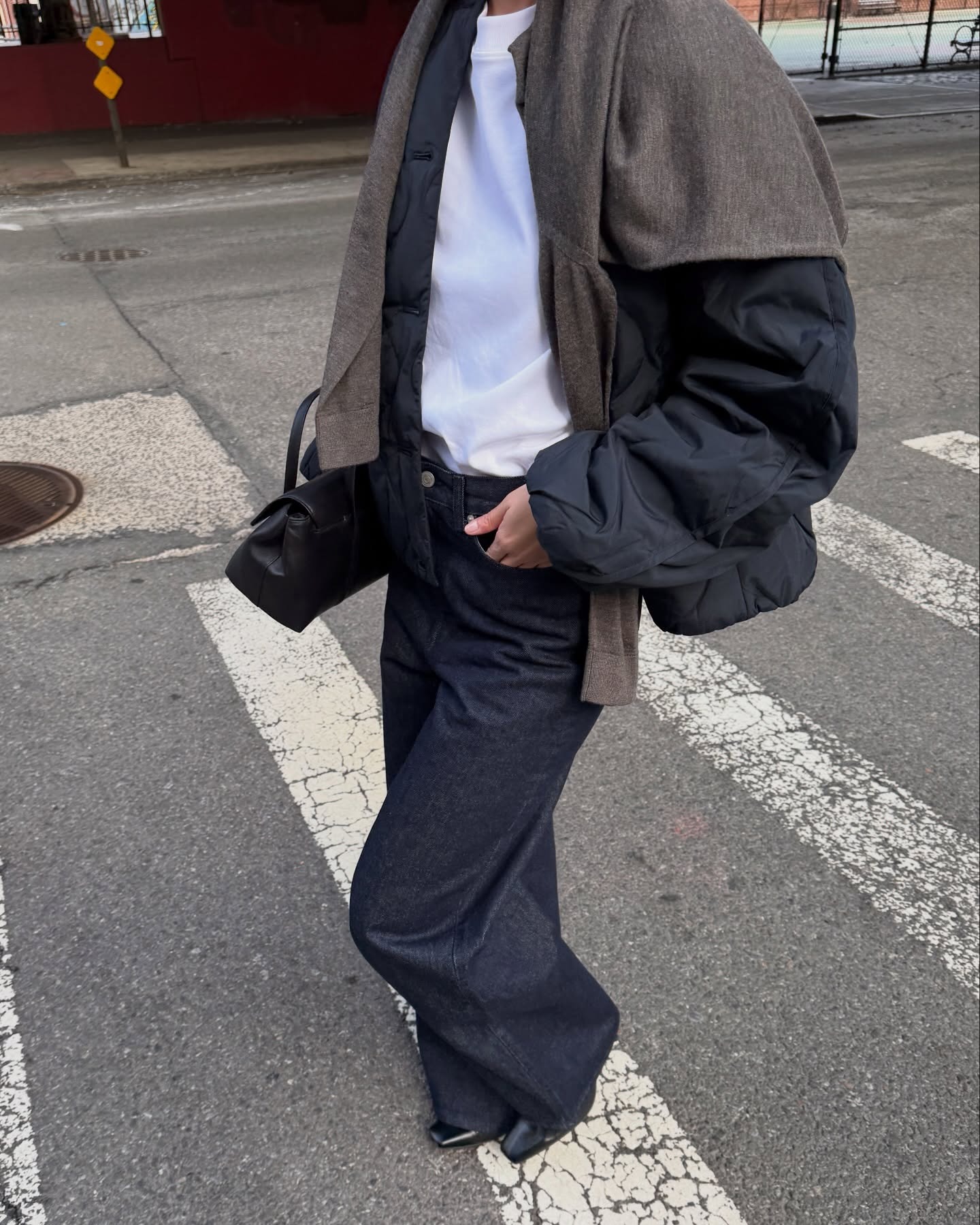 Mimi wearing COS bag and COS jeans.