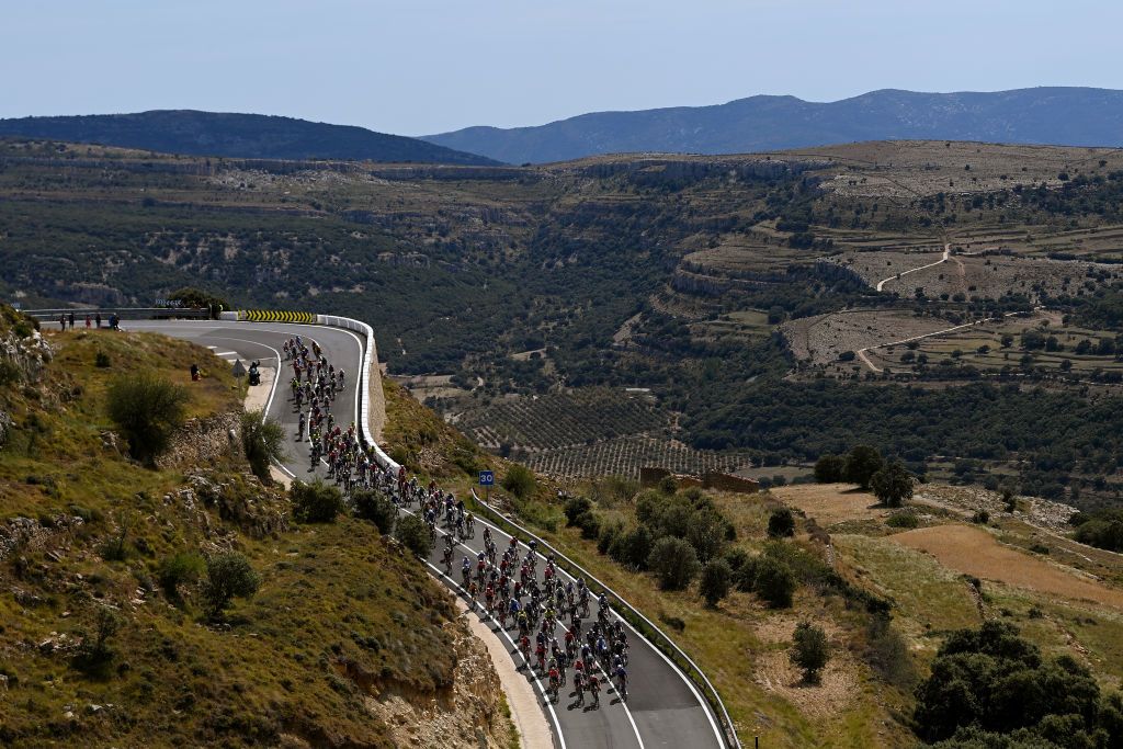 BURRIANA SPAIN AUGUST 30 A general view of the peloton passing through a landscape during the 78th Tour of Spain 2023 Stage 5 a 1846km stage from Burriana to Burriana UCIWT on August 30 2023 in Morella Spain Photo by Tim de WaeleGetty Images