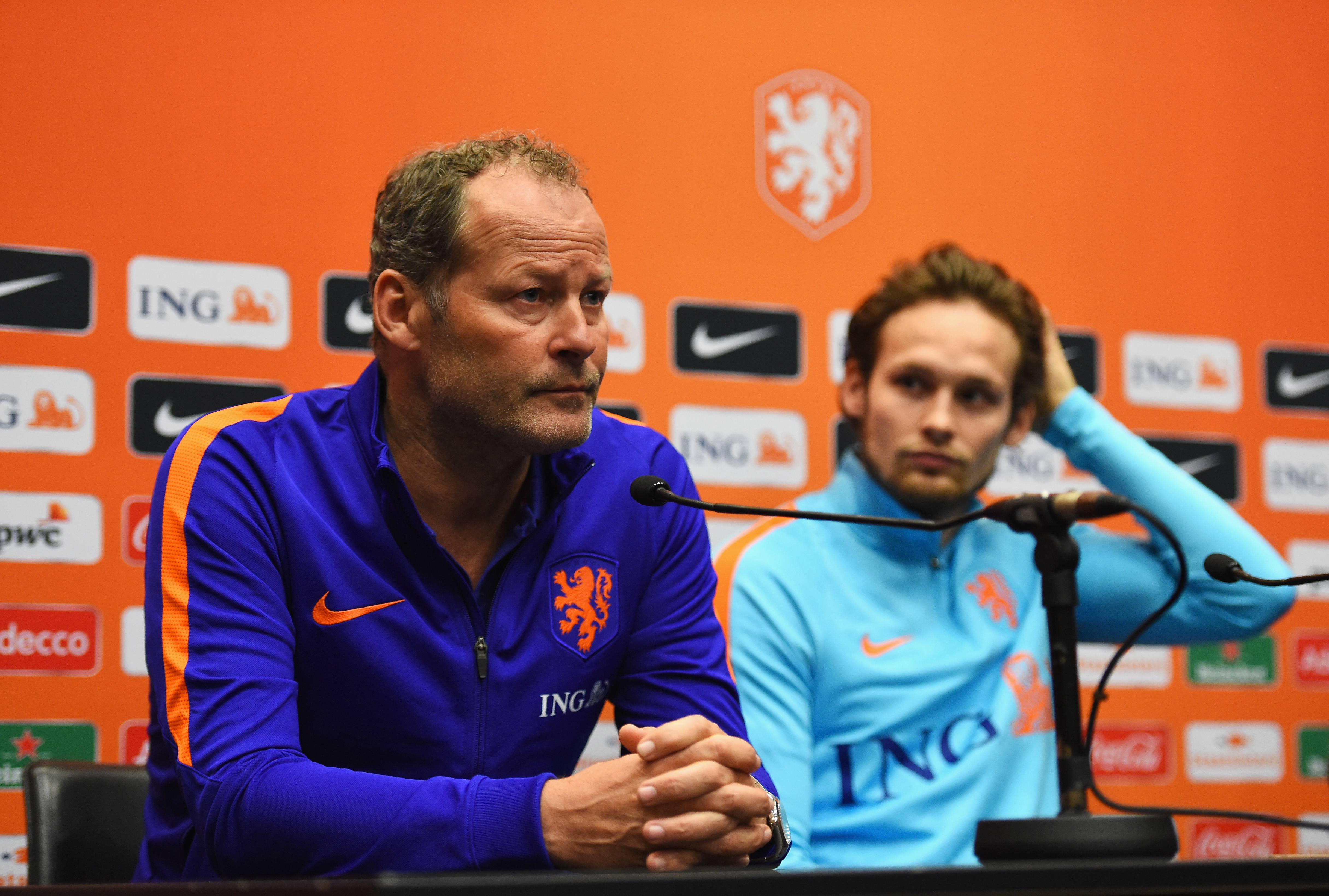 Netherlands coach Danny Blind and player Daley (his son) talk to the media ahead of a game against England in March 2016.