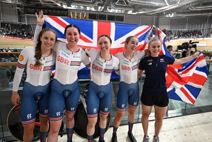 Women's team pursuit team celebrate victory