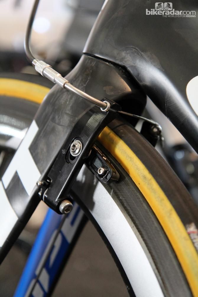 Giant specs custom TRP carbon composite linear-pull brakes on production Propel Advanced SL bikes but the team gets custom units made of machined aluminum that more readily accommodate wide-profile rims and feature a more cable-friendly clamp. The fully enclosed stainless steel noodle - not to mention the tighter connection to the arm - yields a much better lever feel, too.