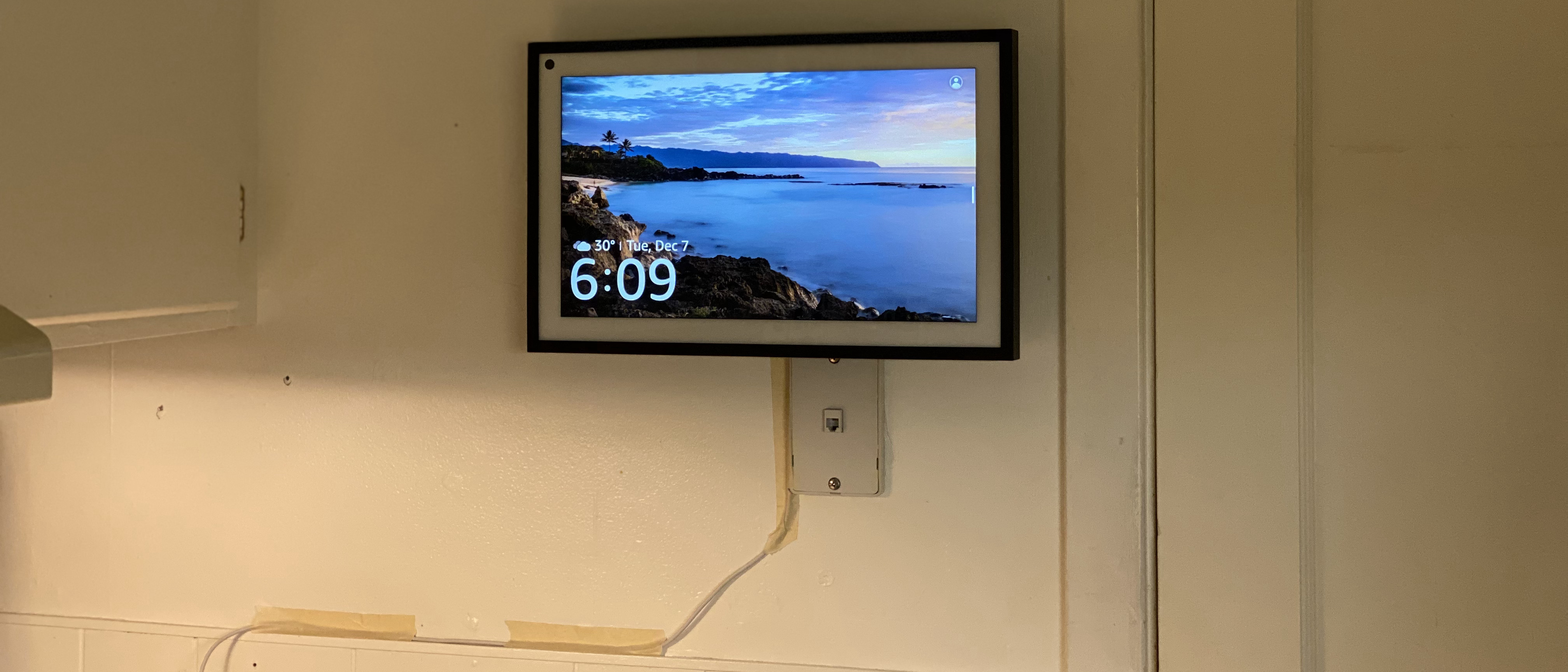 Amazon Echo Show 15 on a kitchen wall