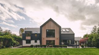 contemporary self build with a mixture of tile cladding and timber cladding