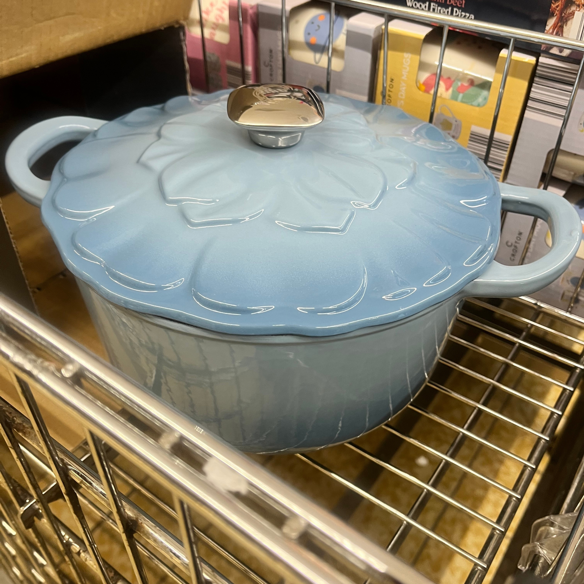The blue petal cast iron in store.