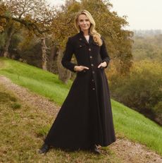 Jennifer Siebel Newsom standing in a field in a photograph by Marie Claire