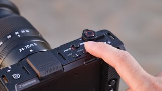 Closeup of Nikon ZR mode selection buttons
