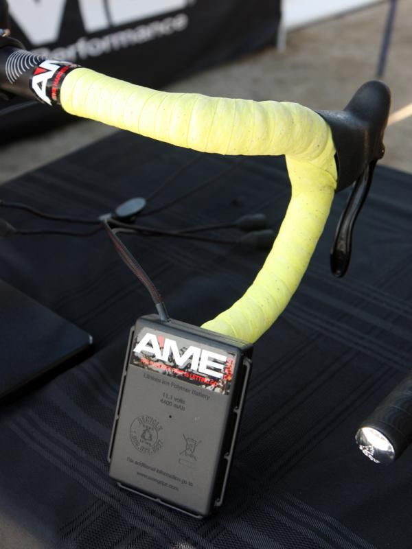 A'ME adds a road version of its heated grips for 2012. The heating element wraps around the bar before tape is installed and A'ME says it's enough to cover about 14cm (5.5in) of handlebar. The Li-ion battery pack is still awkwardly shaped for bicycle use, though.