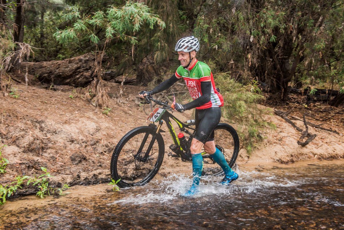 Erik Dekker pushes through the creek