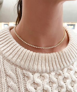 woman wearing a Material Good diamond necklace