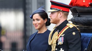 Meghan, Duchess of Sussex and Prince Harry, Duke of Sussex arrive at Trooping The Colour
