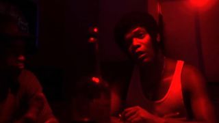 Samuel L. Jackson bathed in red light looking very angry in Menace II Society