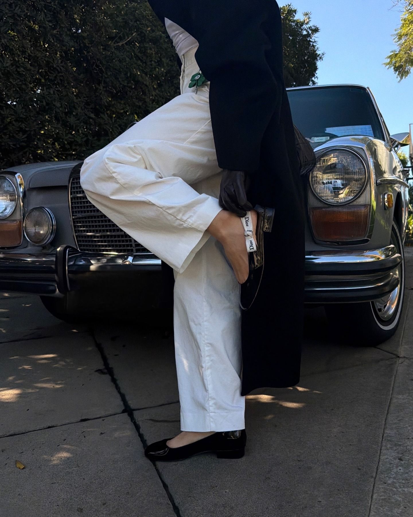 Photos of Aimee Song wearing the new Jonathan Anderson for Dior J'Adior patent leather ballet flats from the spring/summer 2026 collection.