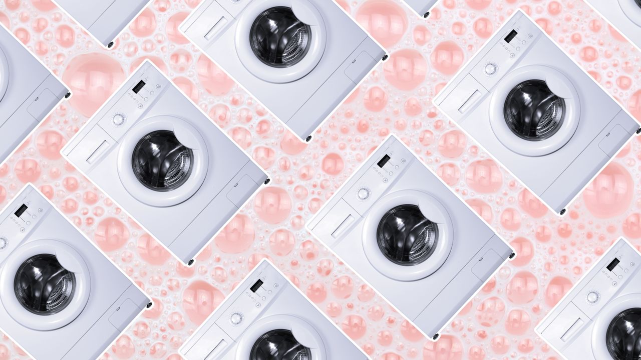 Washing machines on pink sudsy background