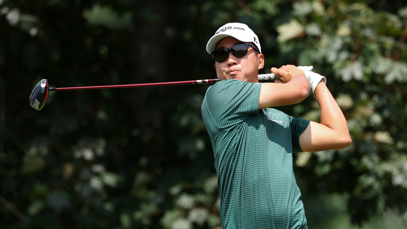 Michael Kim hits a driver off the tee