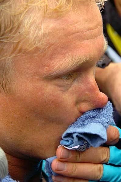 Alexander Vinokourov (Astana) wipes of the sweat of a hard day's work.