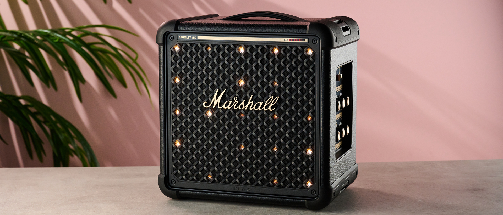 Marshall Bromley 150 on table against pink background