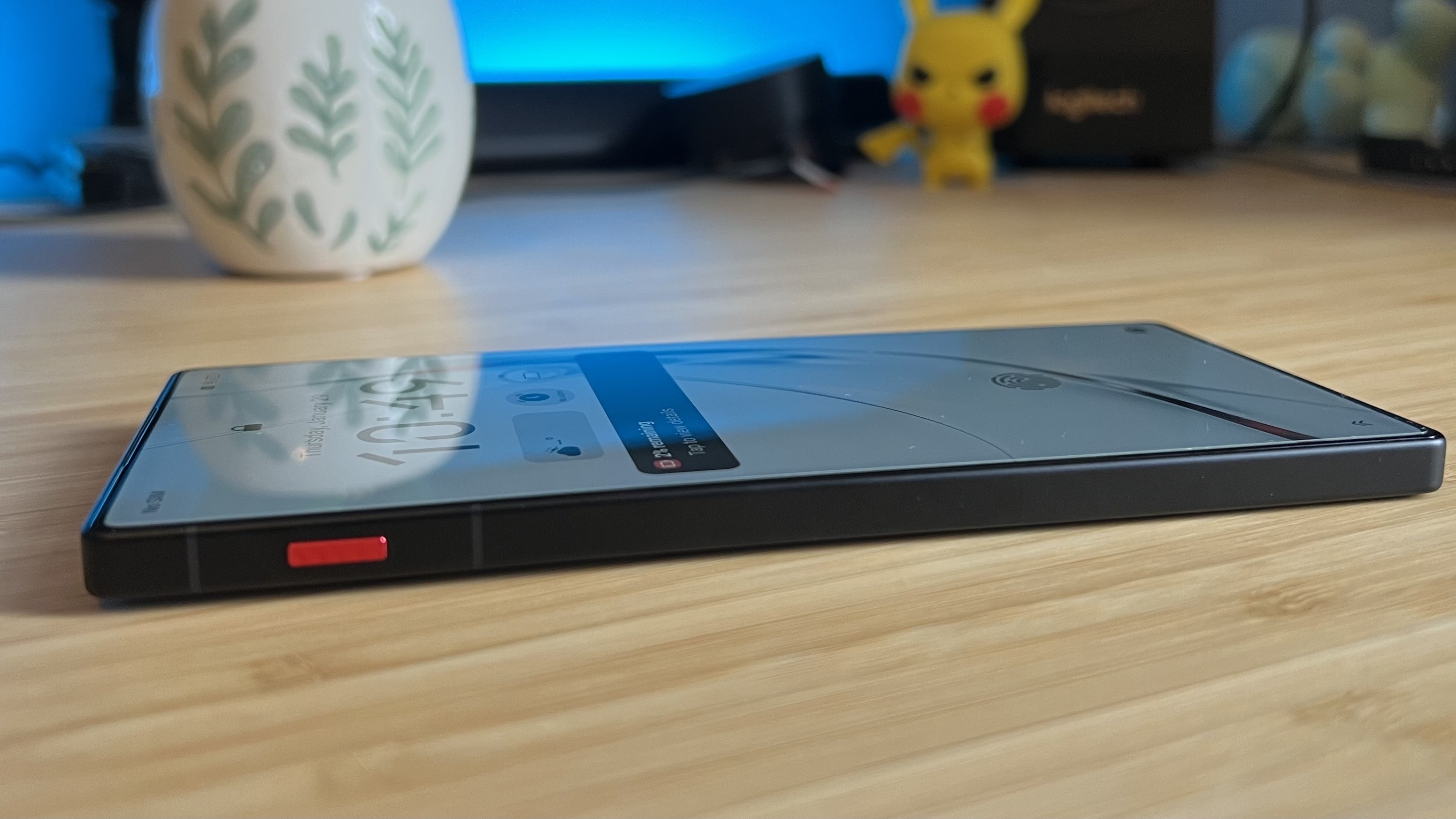 RedMagic 11 Air laying flat on a wooden desk