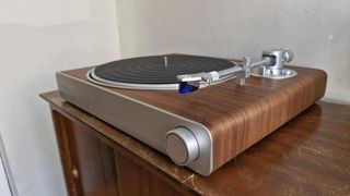 Victrola Stream Sapphire turntable on a wooden table