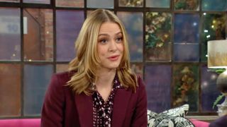 Hayley Erin as Claire Grace in a maroon blazer in The Young and the Restless