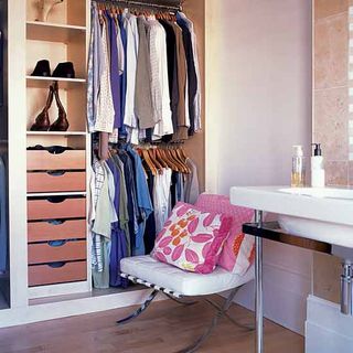 dressing room with wardrobe and sink