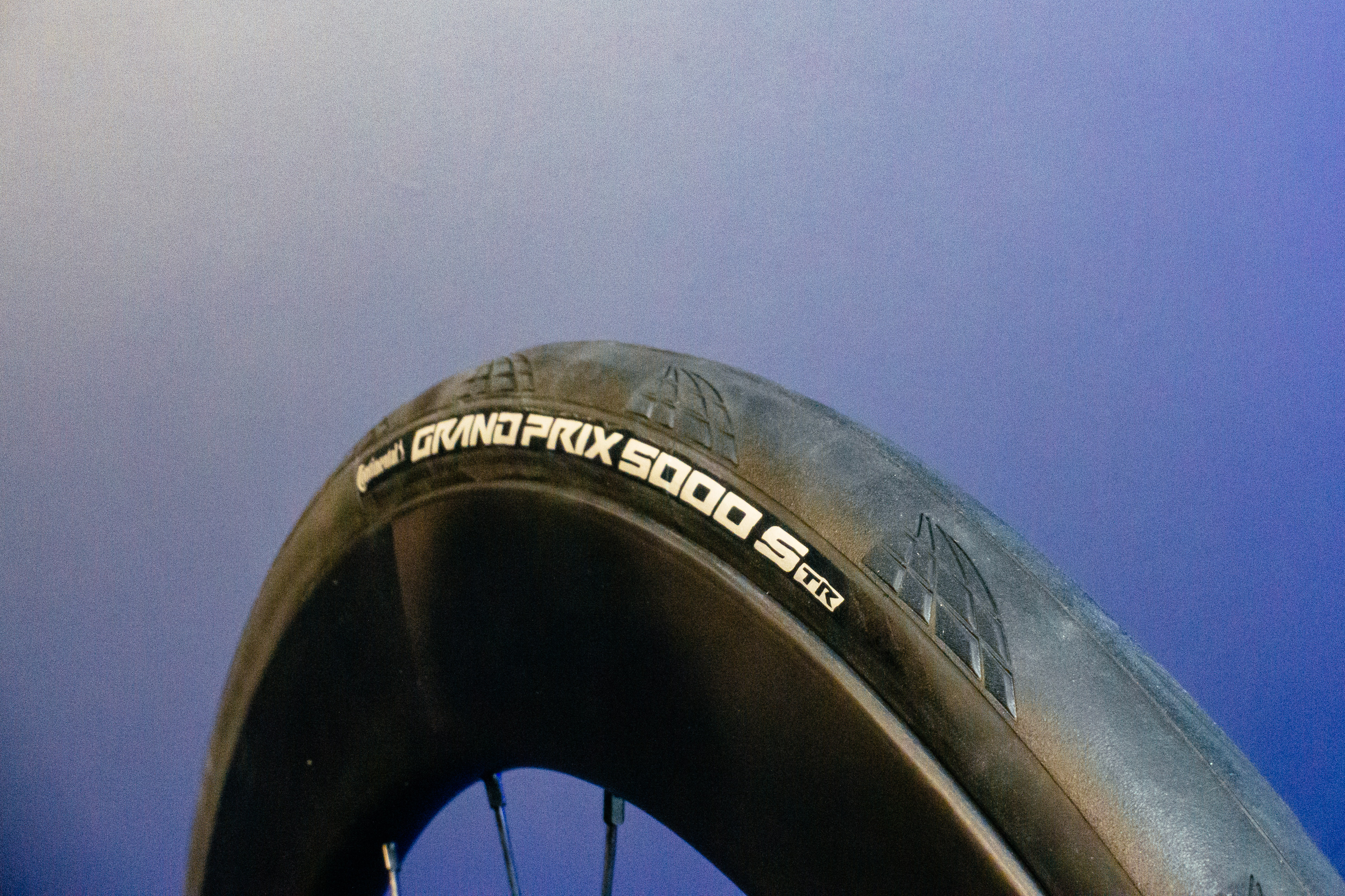 Continental GP5000 S TR Road tyre on a blue background