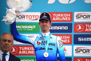 ZMIRKARIYAKA TURKEY APRIL 12 Kaden Groves of Australia and Team Bikeexchange Jayco on second place poses on the podium ceremony after the 57th Presidential Cycling Tour Of Turkey 2021 Stage 3 a 1179km stage from eme to zmir Karyaka TUR2022 on April 12 2022 in emezmir Karyaka Turkey Photo by Dario BelingheriGetty Images