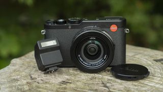 The Leica D-Lux 8 and flash unit