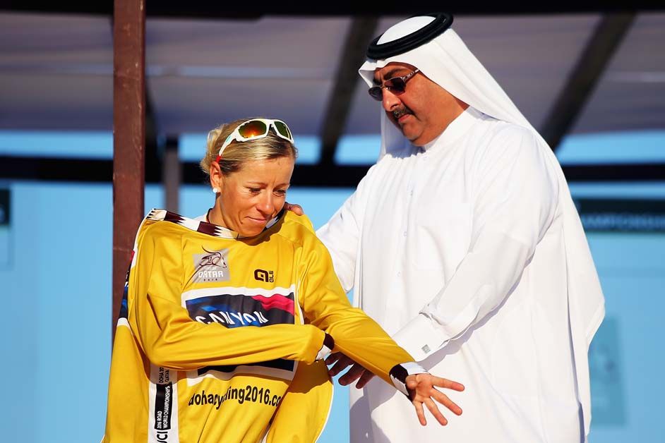 Trixi Worrack puts on her gold jersey