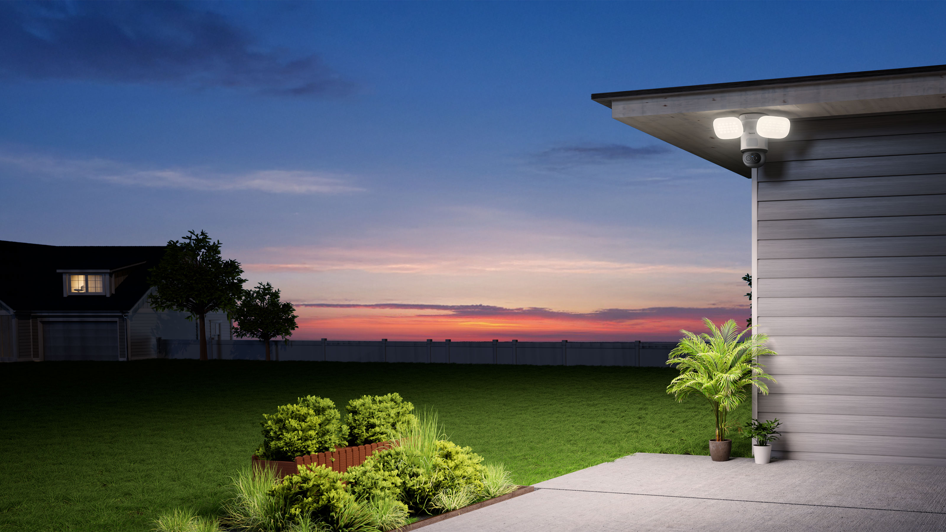 Reolink floodlight security camera on building at night, with lights illuminated and another house in the background